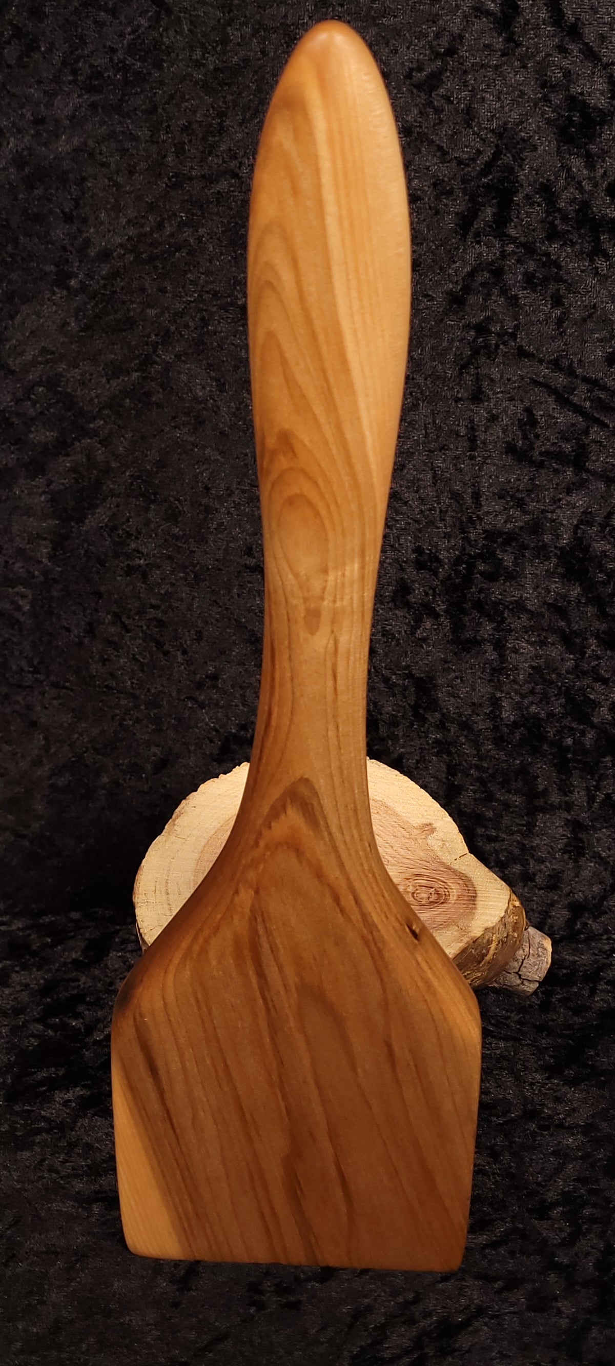 Curly maple spoon side view