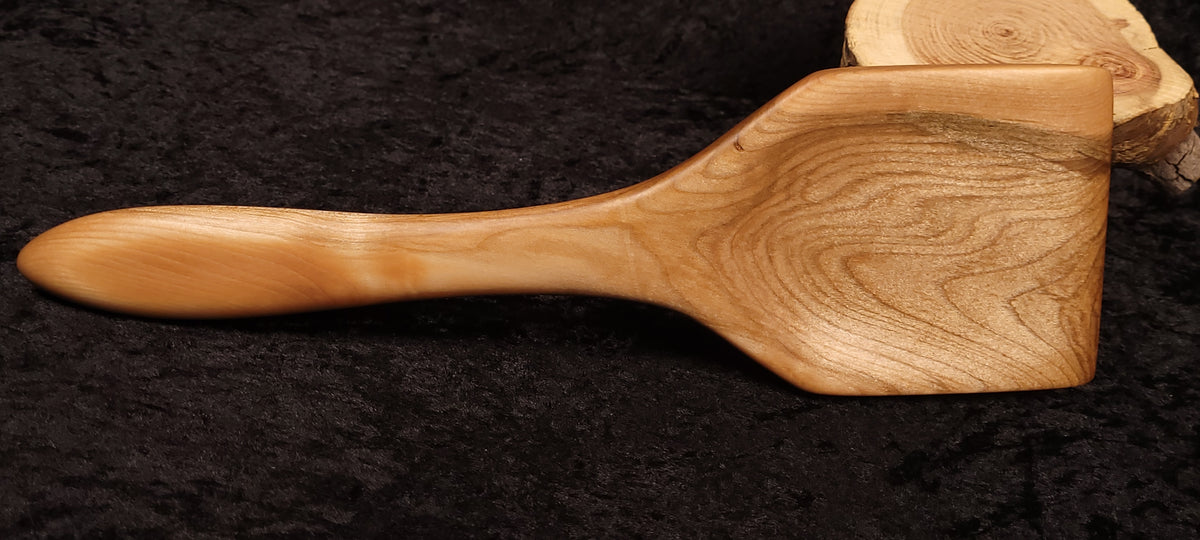 Curly maple spatula overhead view showing grain