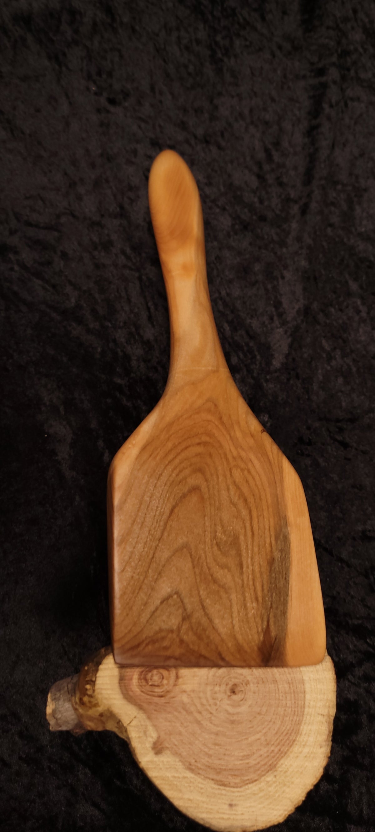 Curly maple spoon side profile view