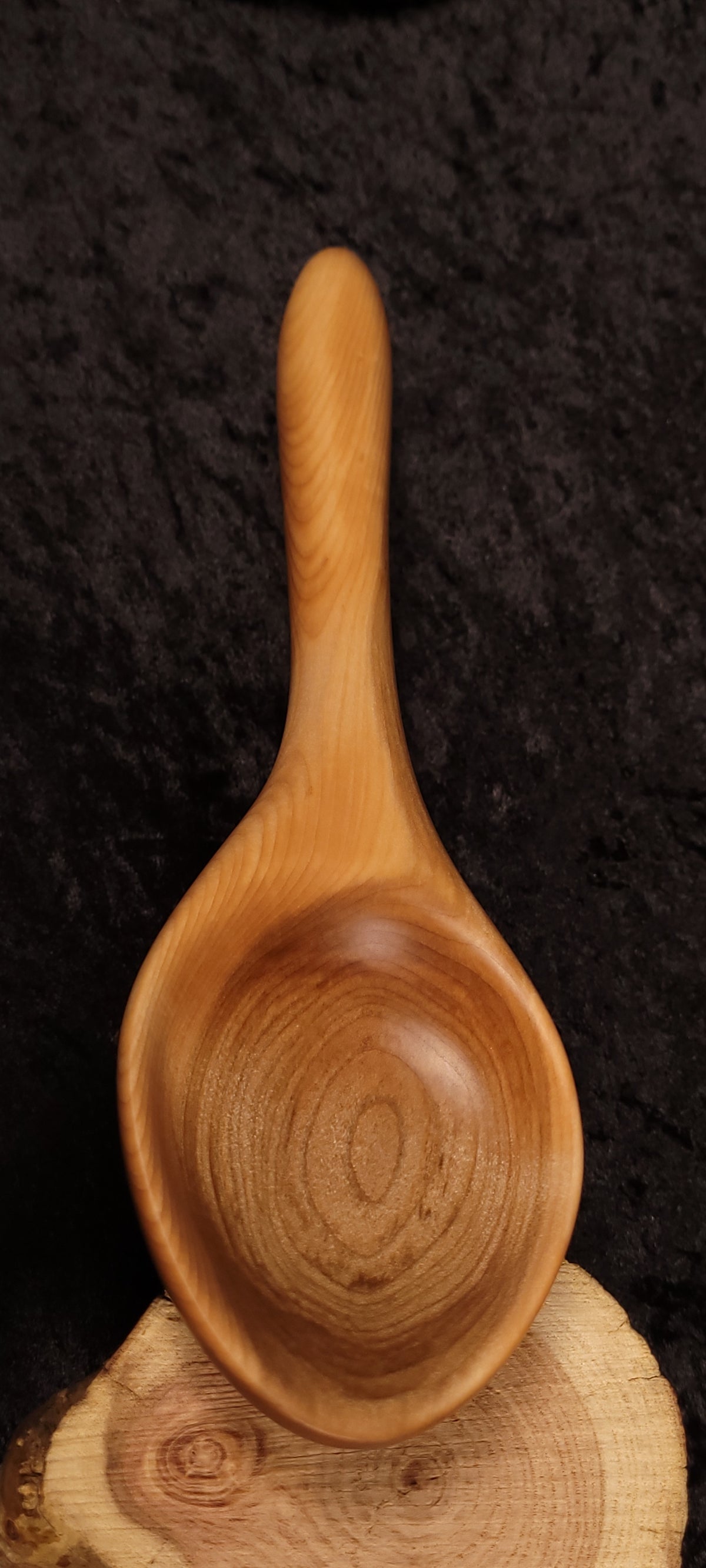 Curly maple spoon bowl close-up