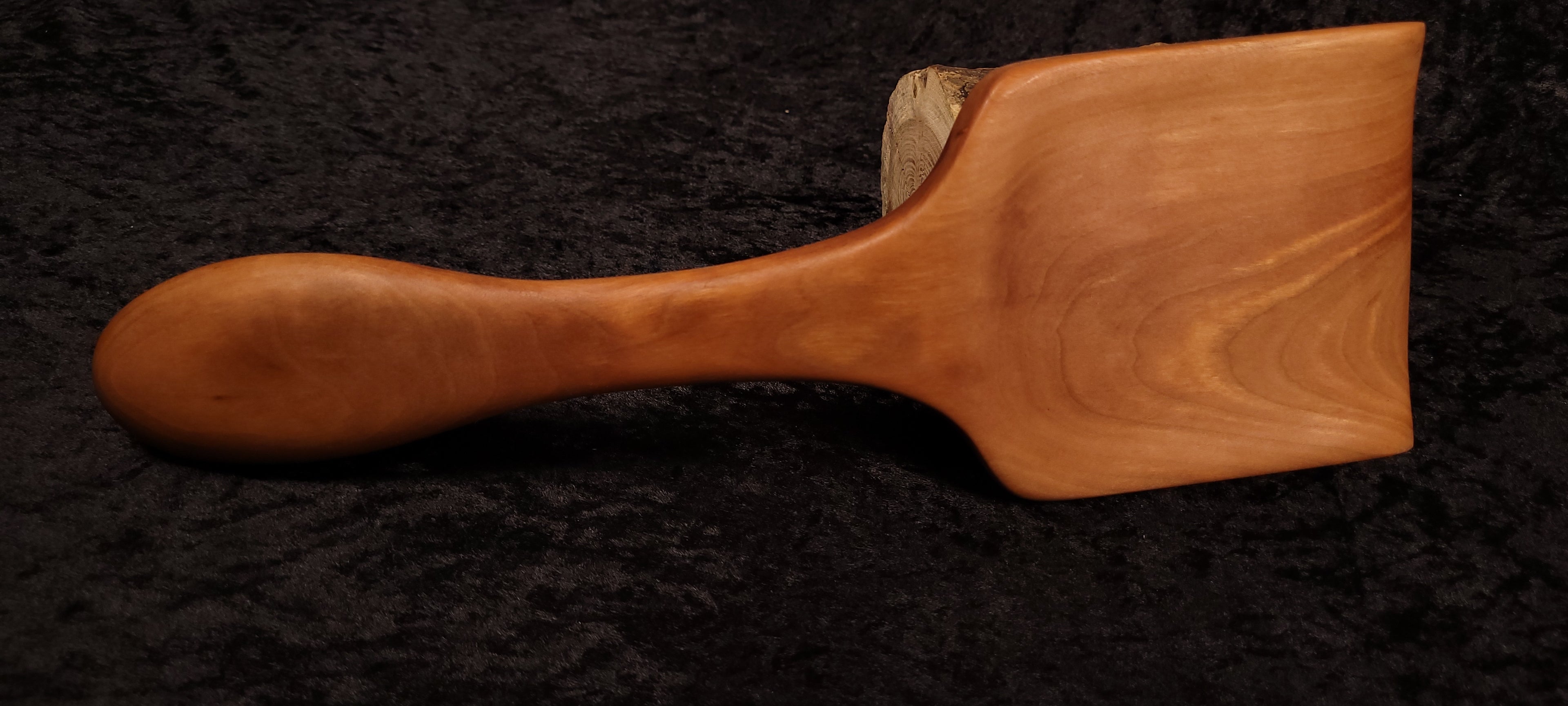 Cherry wood spoon close-up
