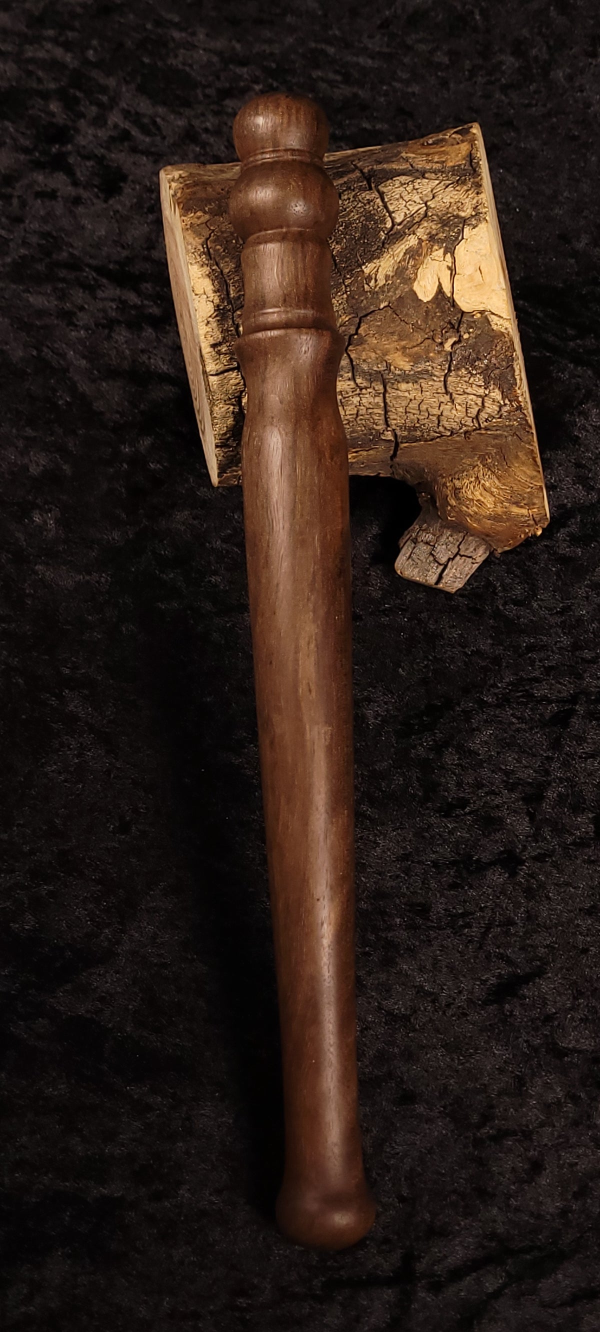 Walnut spurtle back view showing handle detail
