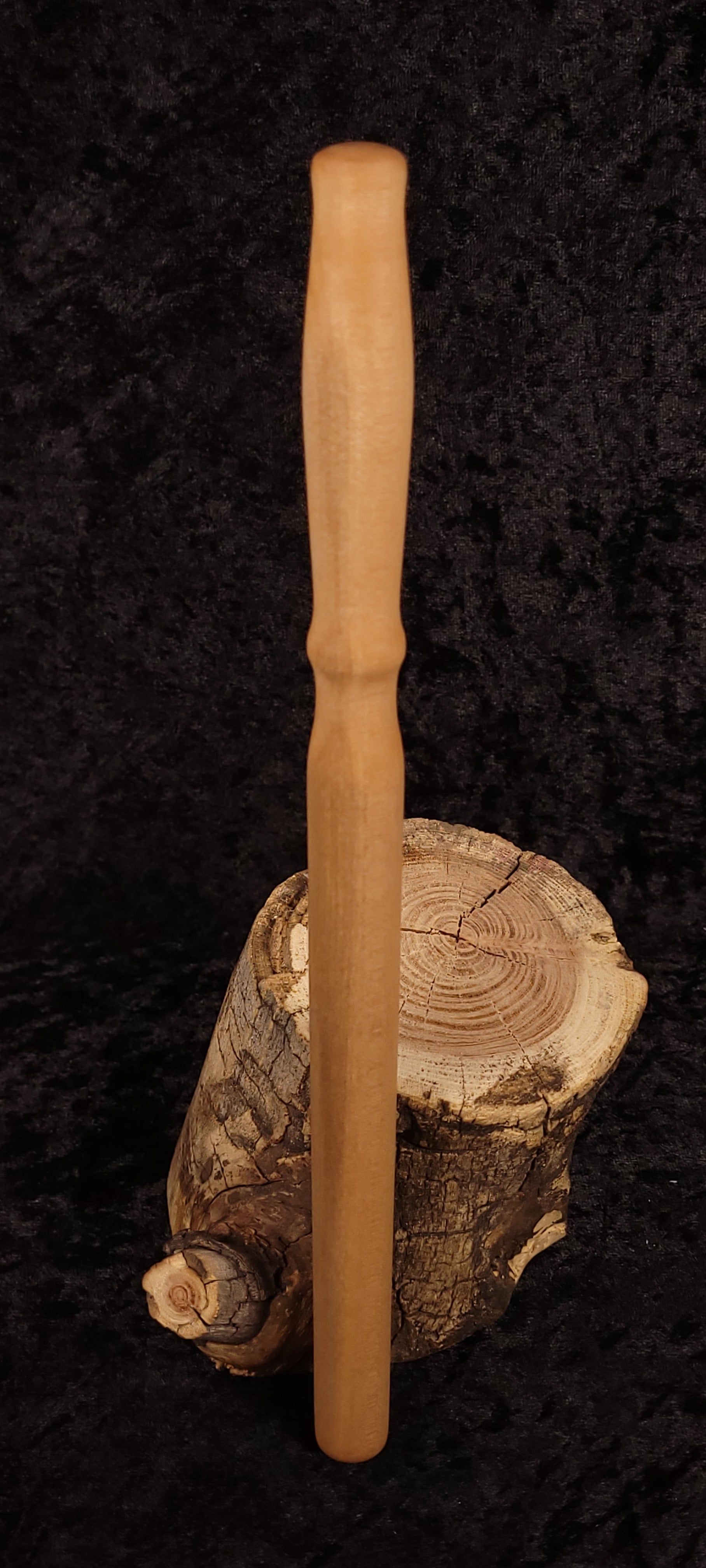 Handcrafted curly maple spurtle - side view