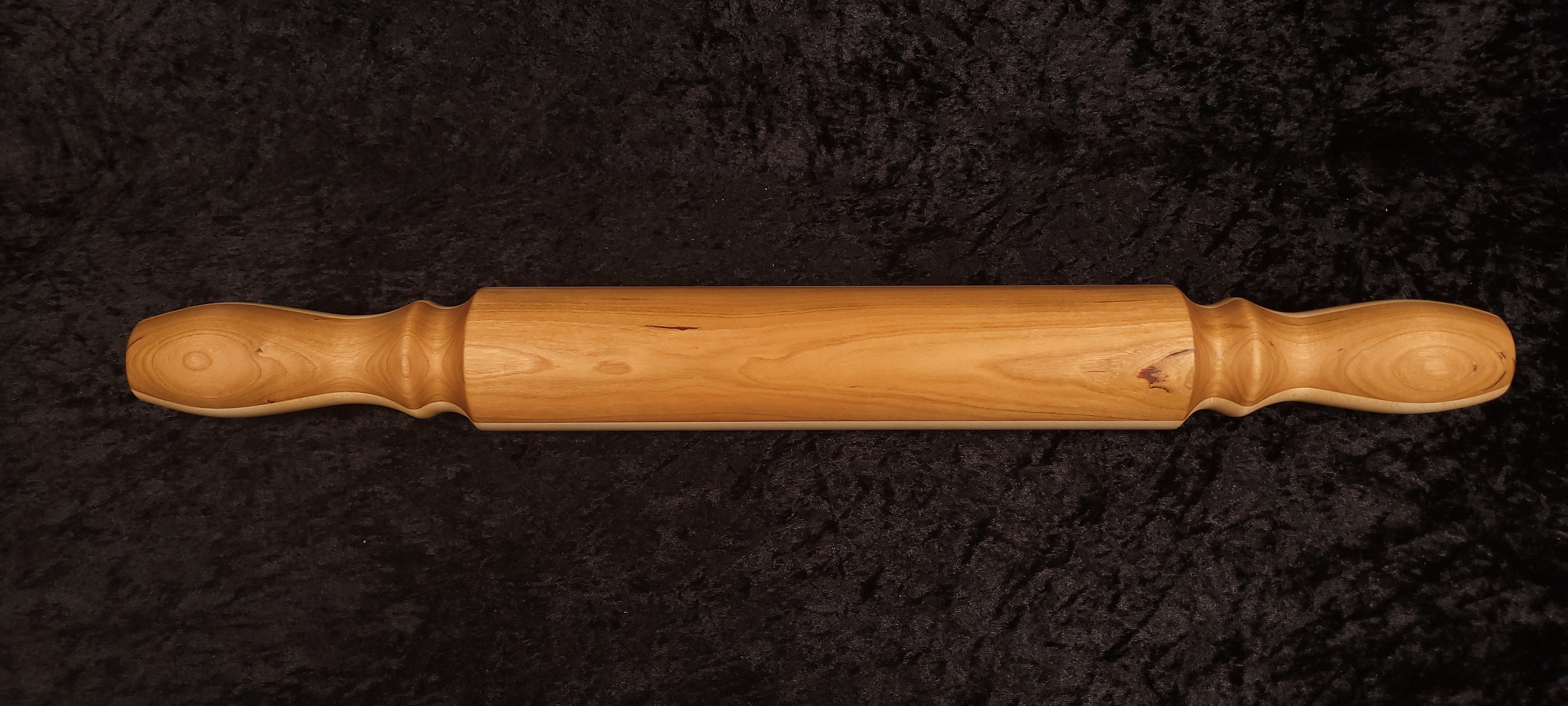 Cherry rolling pin full length, warm grain top view