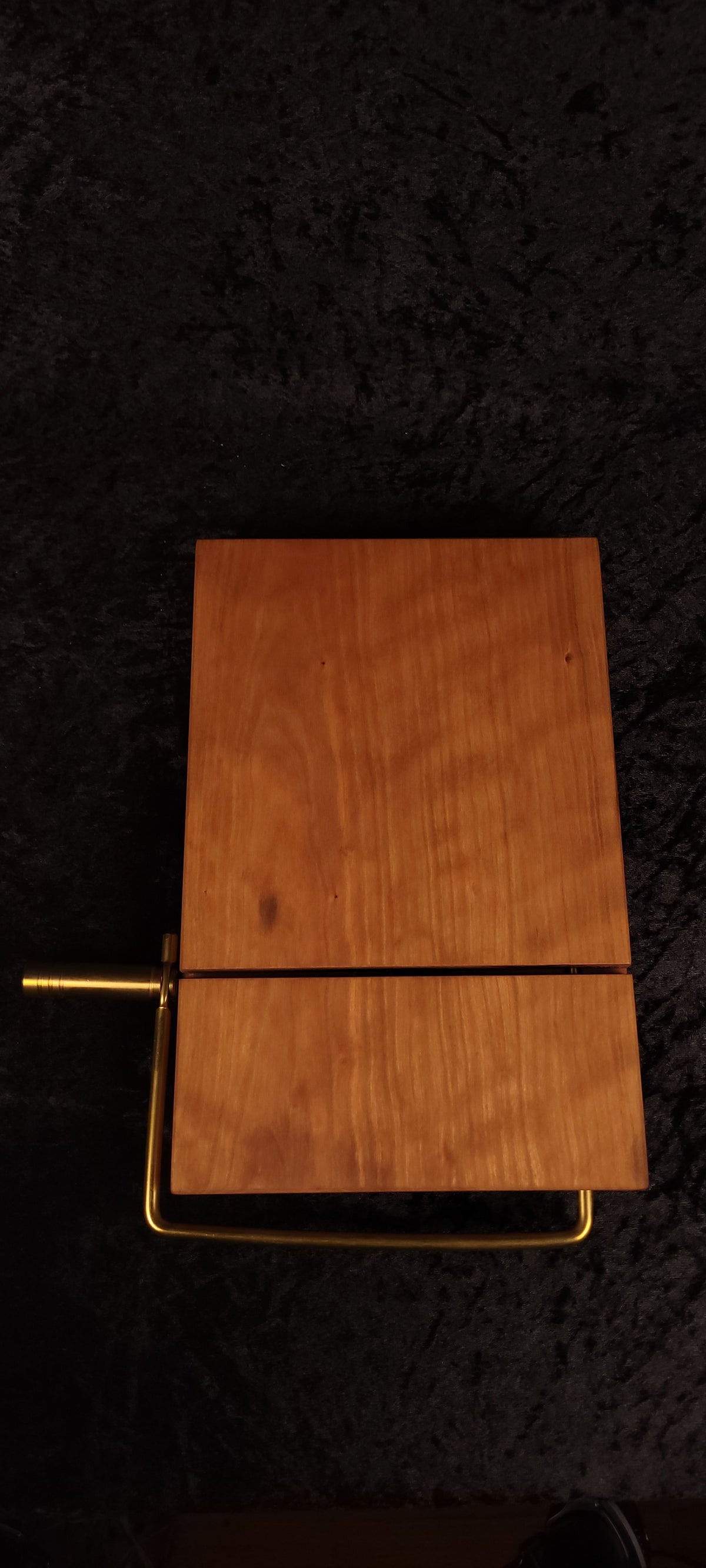 Cherry cheese board with gold wire cutter, top view
