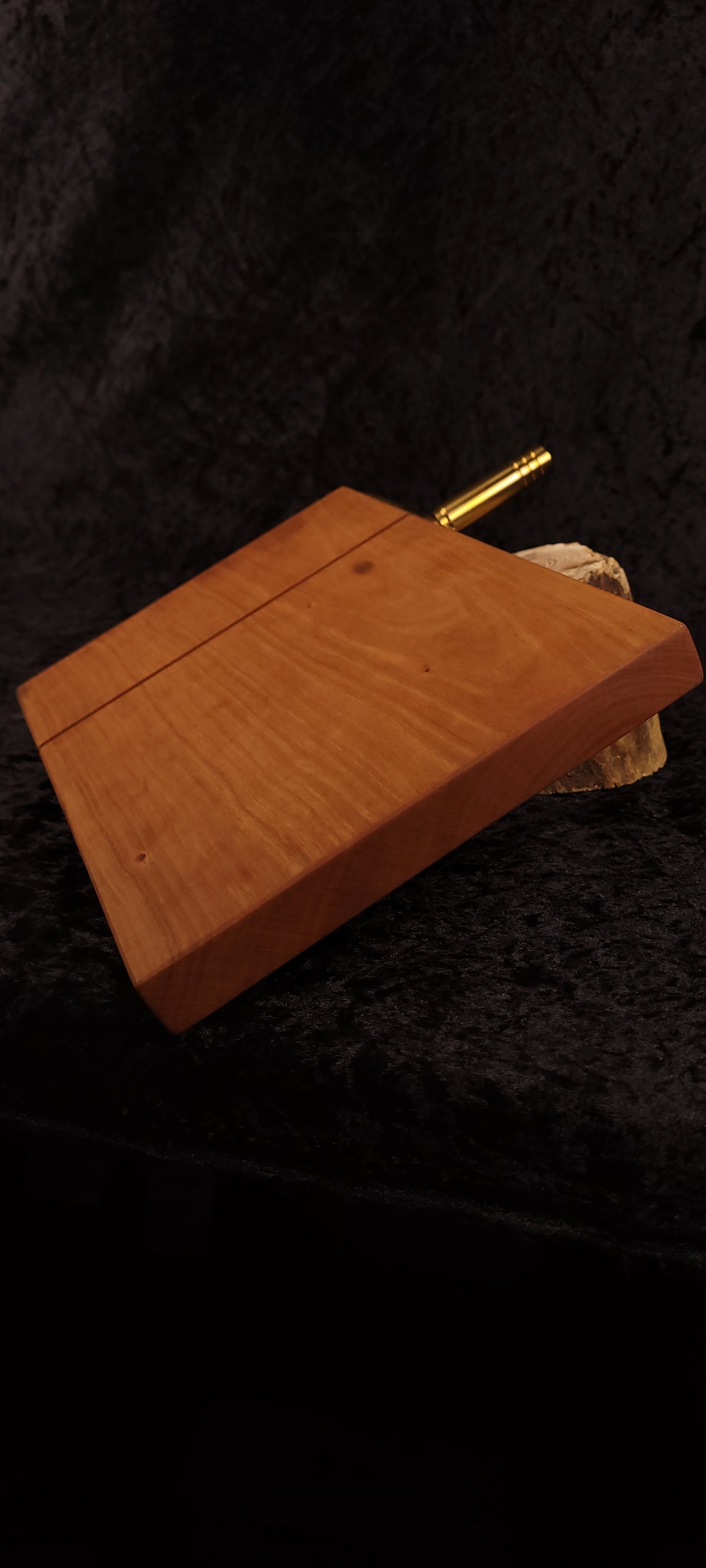 Cherry cheese board bottom view showing rubber feet