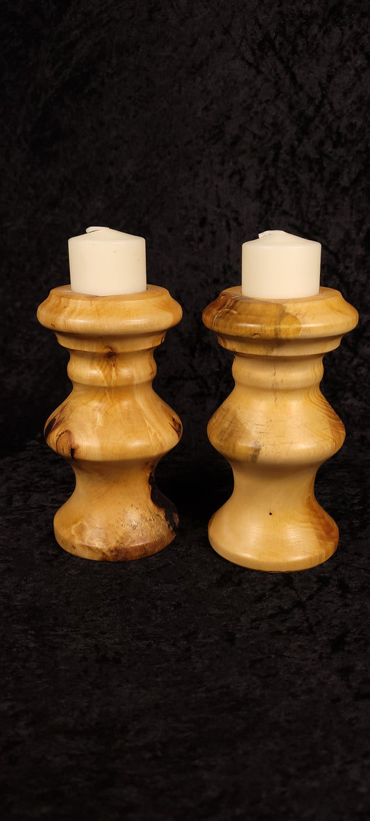 Hand-turned piñon pine candle holder set of 2 front view with pillar candles