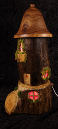Hand-carved fairy house lamp - green glow side view