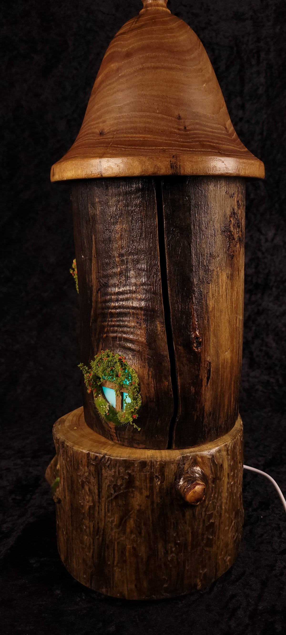 Hand-carved fairy house lamp - scale reference with hand