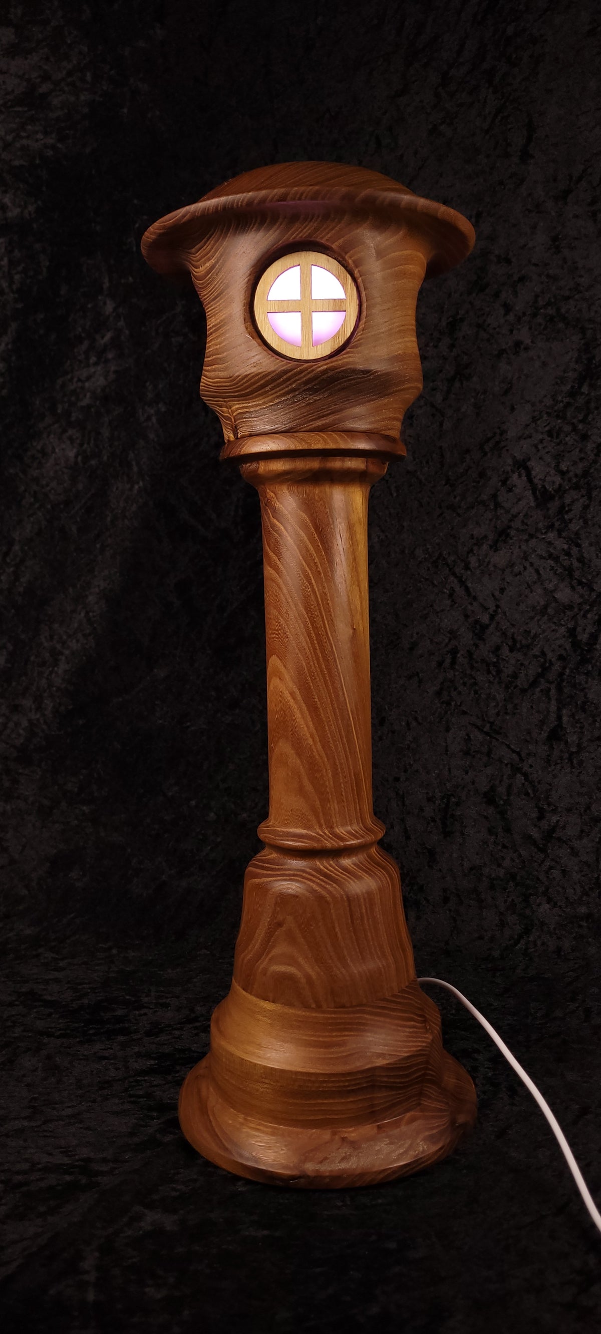 Hand-turned fairy tower lamp - three windows red glow side view