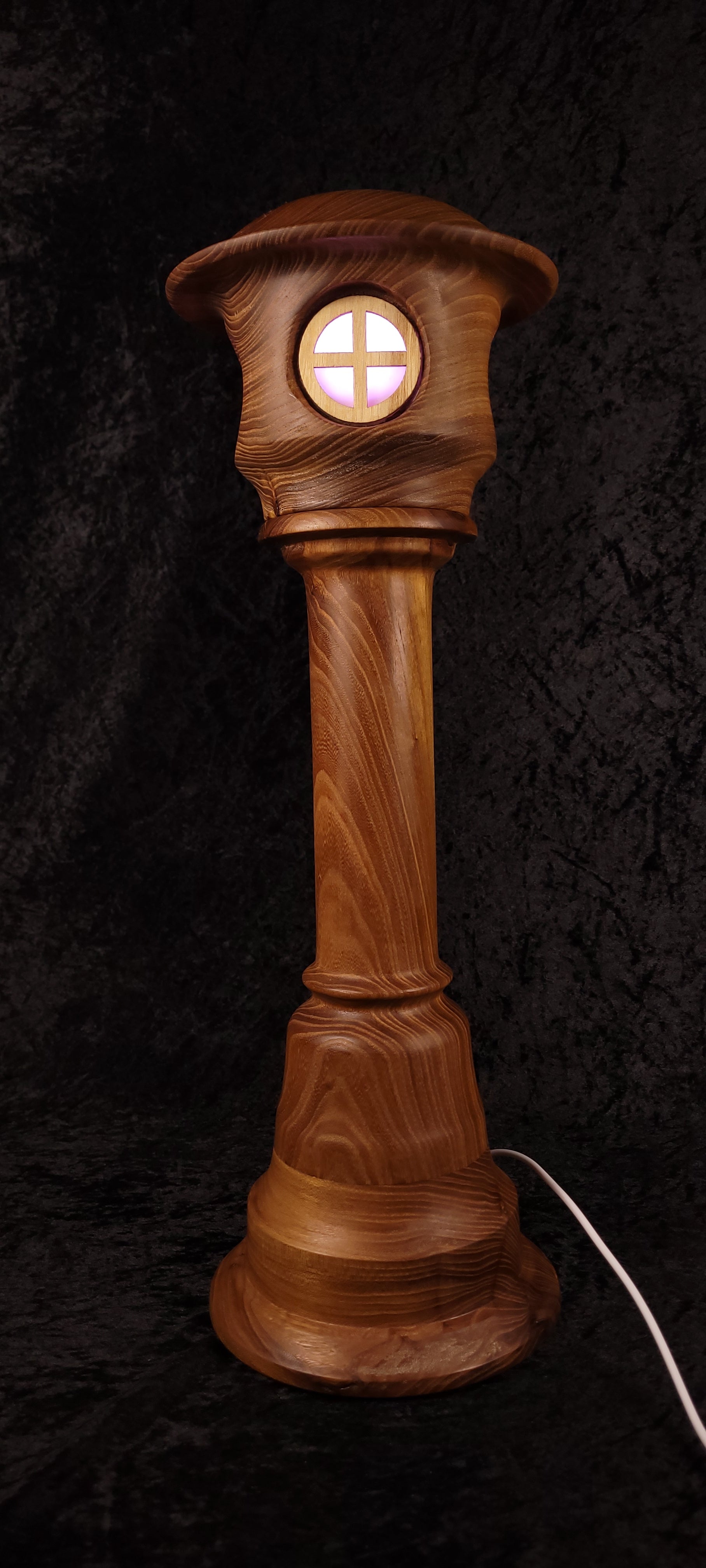 Hand-turned fairy tower lamp - three windows red glow side view