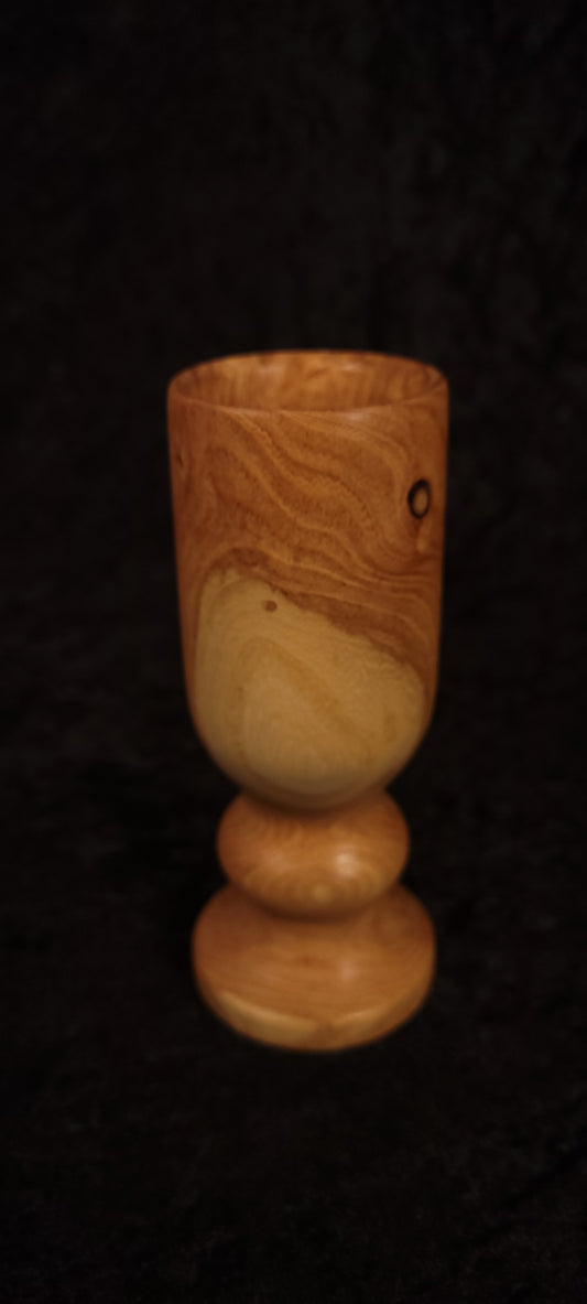 Locust wood toothpick holder held in hand showing scale and two-tone grain