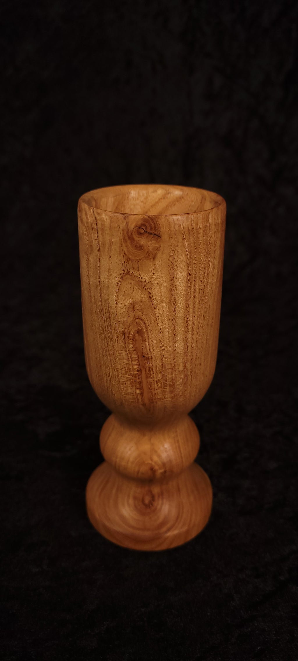 Locust wood toothpick holder filled with toothpicks