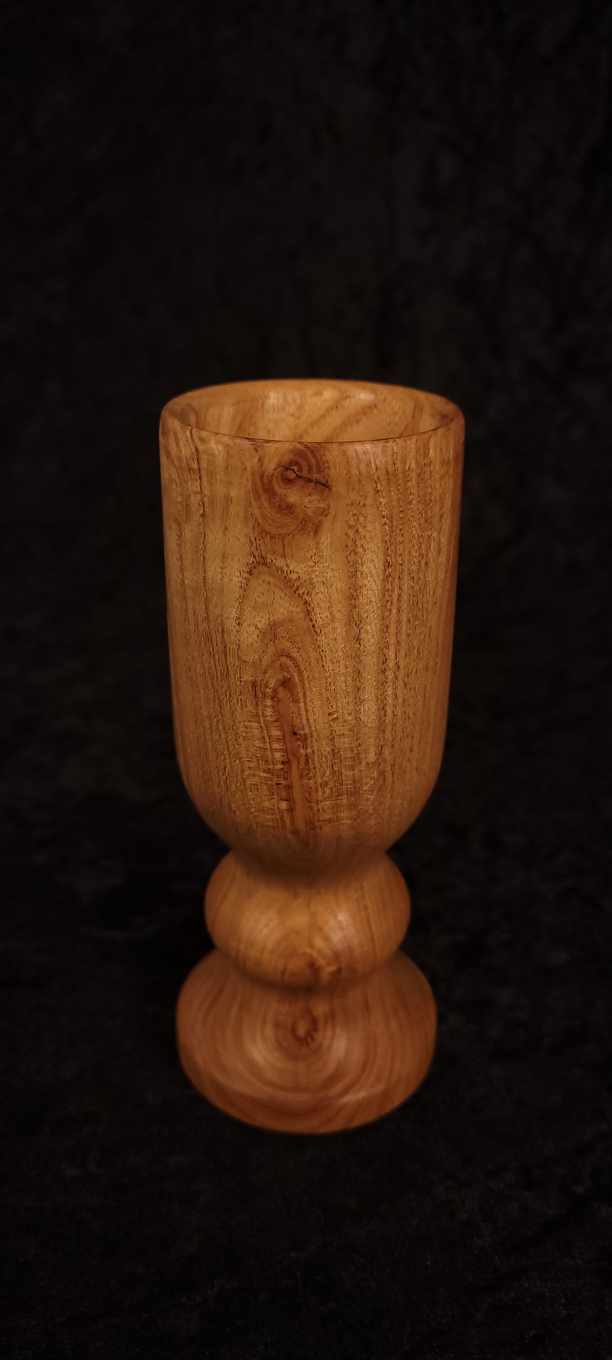 Locust wood toothpick holder filled with toothpicks