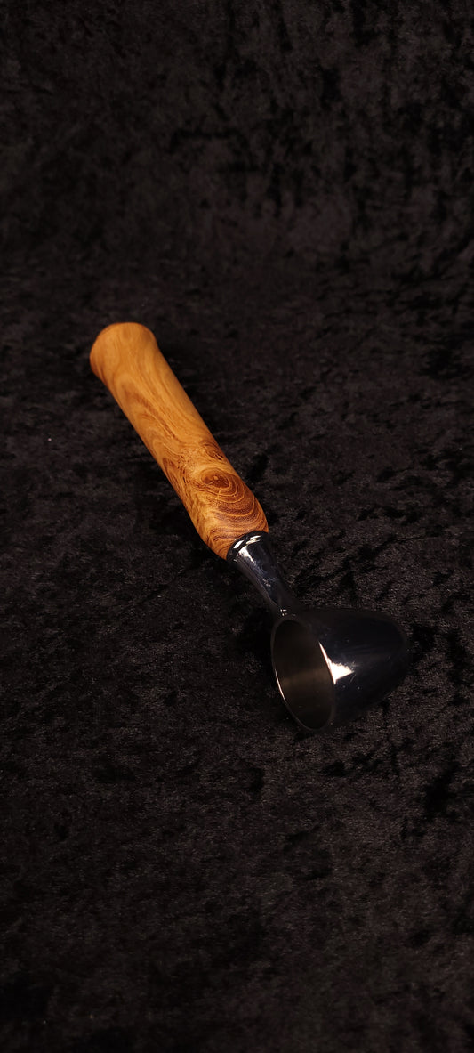 Locust wood coffee scoop angled view showing chrome scoop and figured grain handle