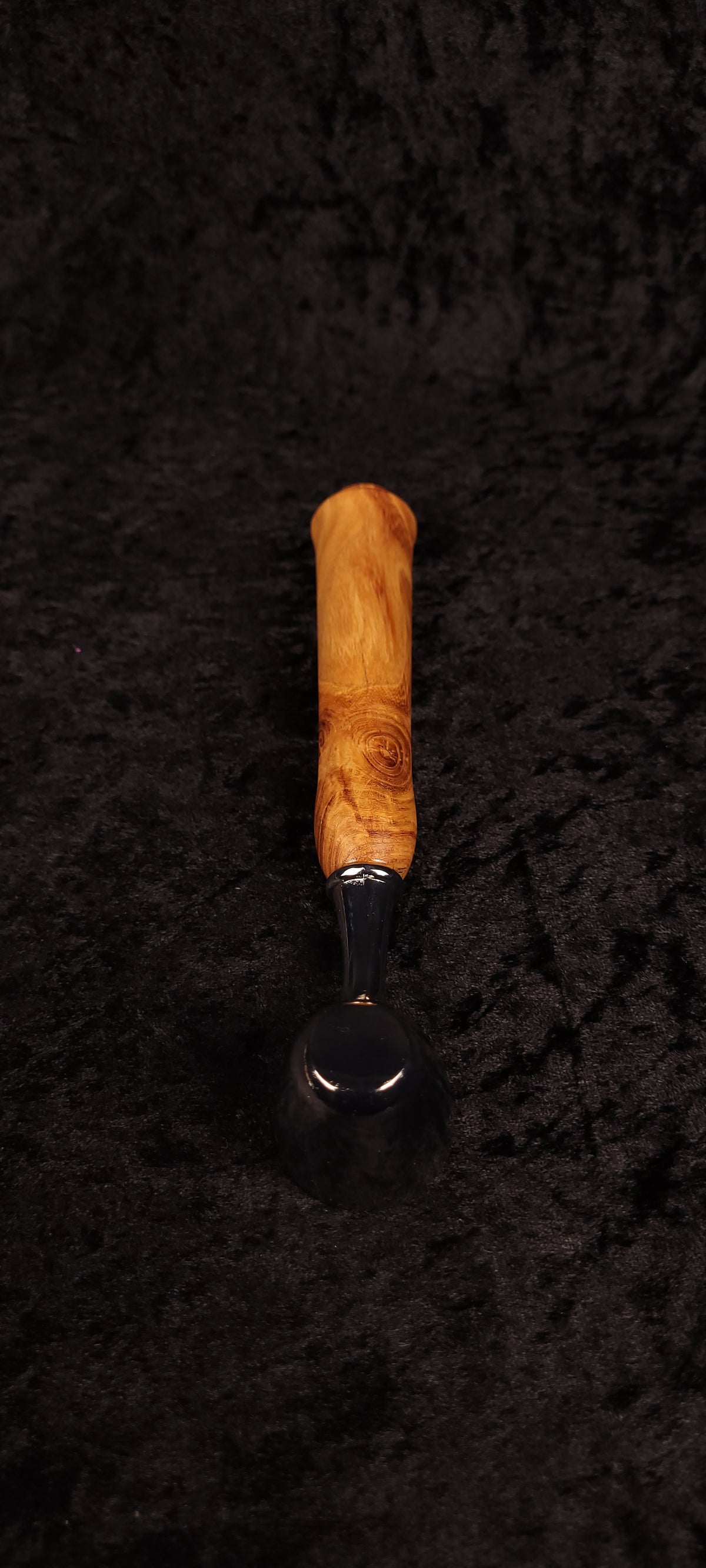 Locust wood coffee scoop top-down view showing handle grain detail
