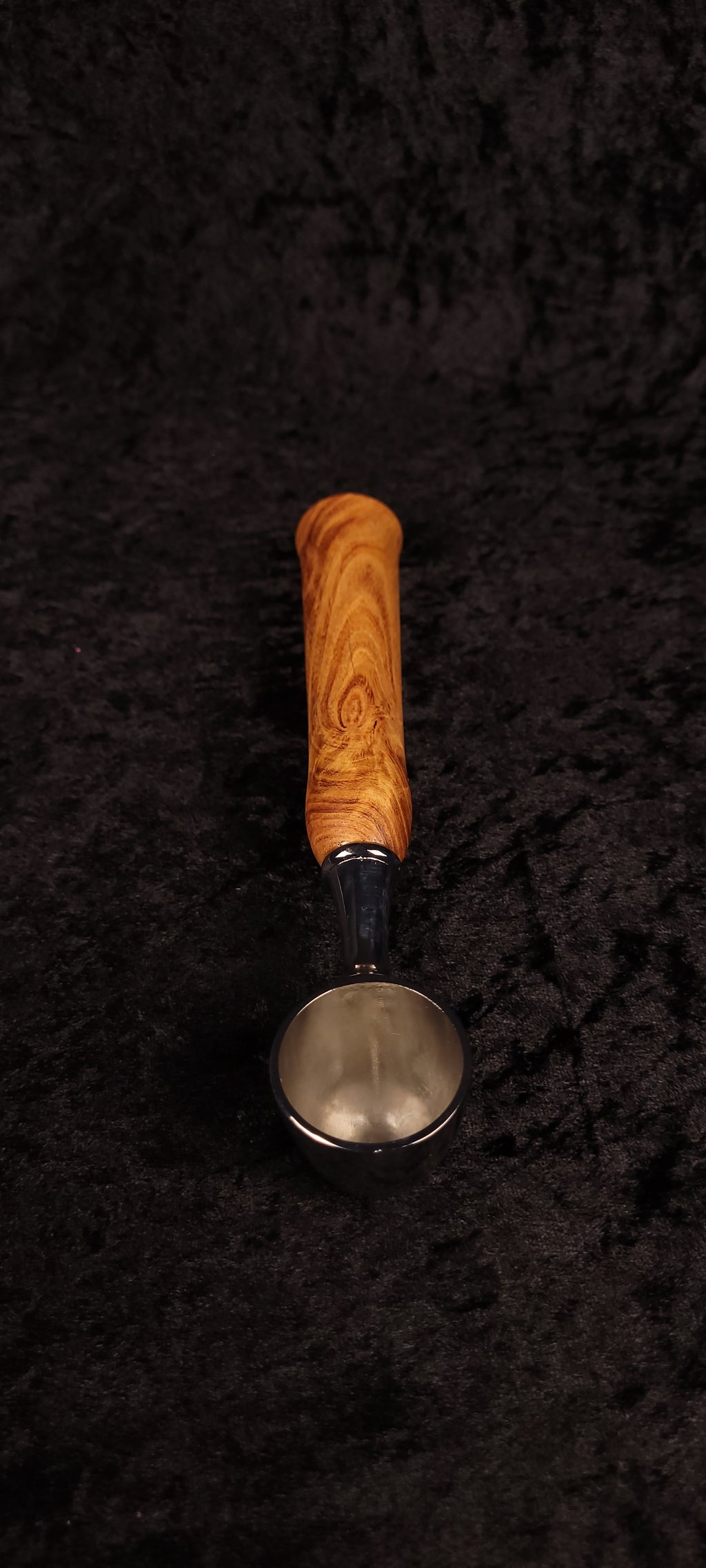 Locust wood coffee scoop upright view showing chrome scoop and handle profile