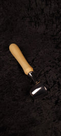 Cottonwood coffee scoop angled view showing chrome dome scoop and pale wood handle
