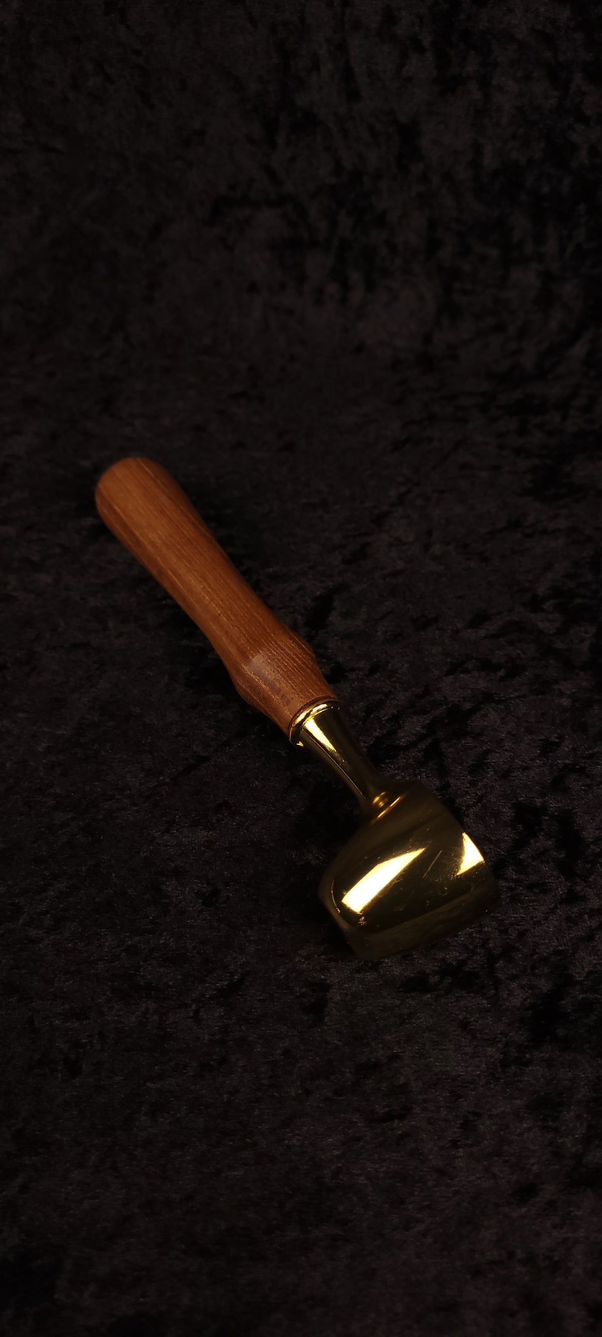 Catalpa wood coffee scoop angled view showing gold dome scoop and warm honey-brown handle