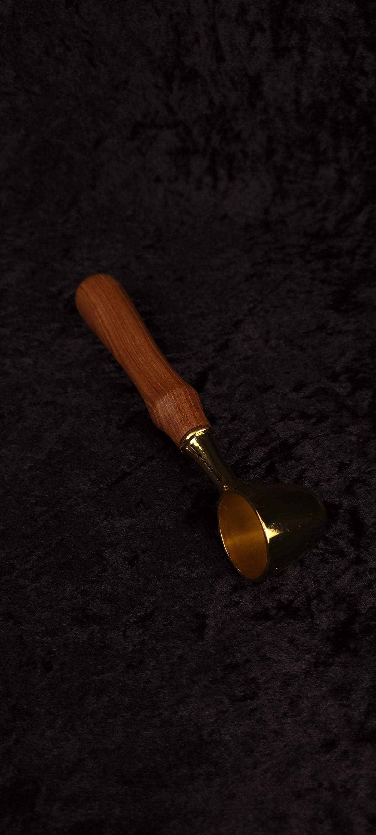 Catalpa wood coffee scoop side view showing gold open-bowl scoop and handle