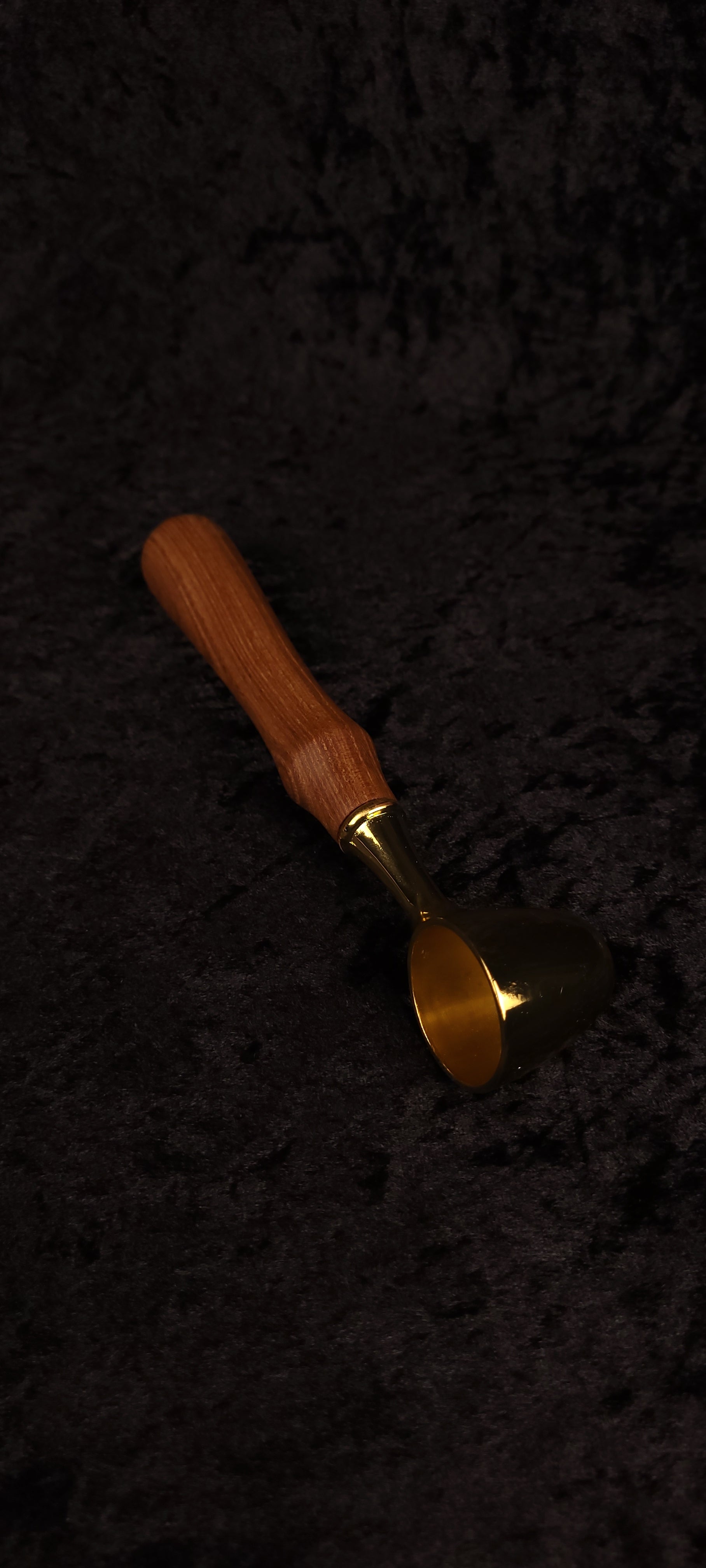 Catalpa wood coffee scoop side view showing gold open-bowl scoop and handle