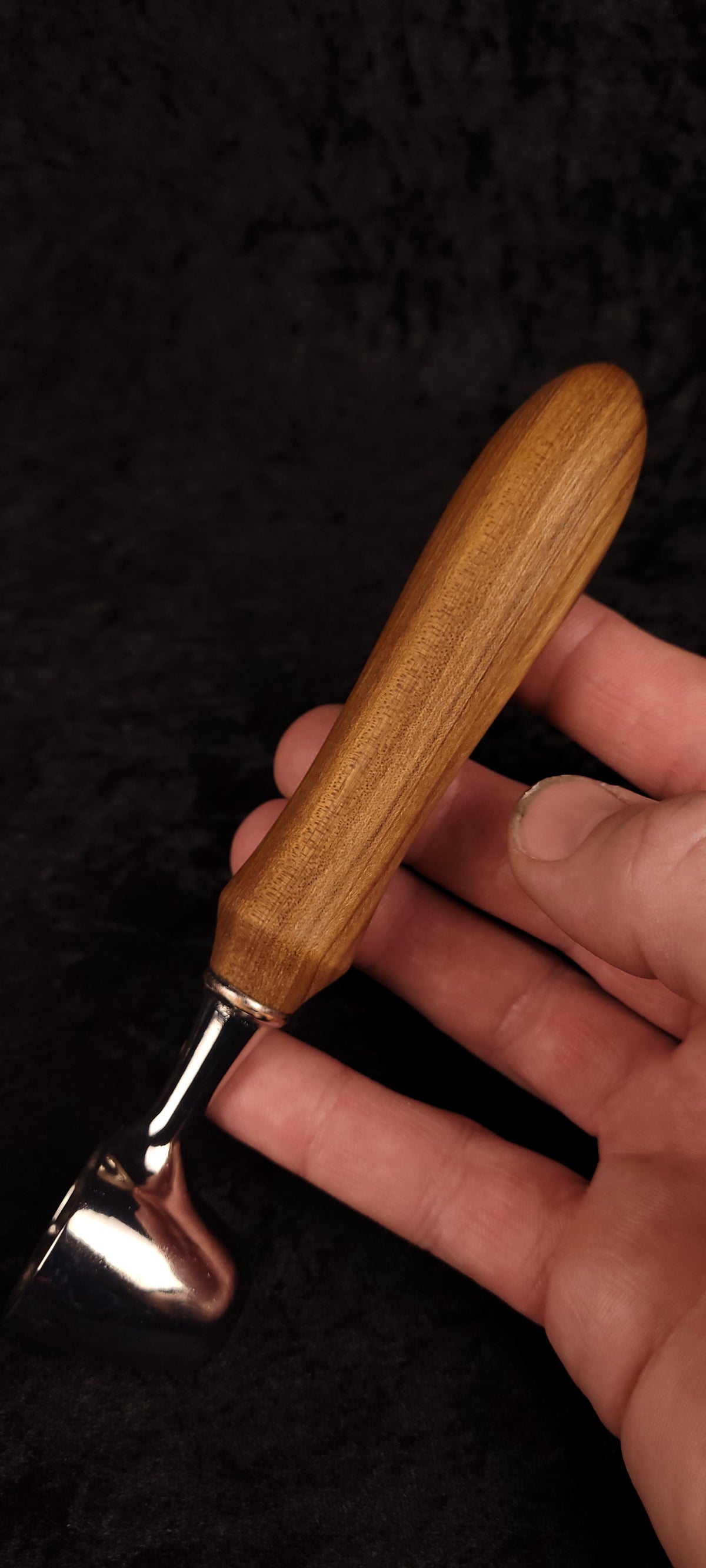 Catalpa wood coffee scoop No. 3 held in hand showing scale, chrome dome scoop and warm Catalpa handle