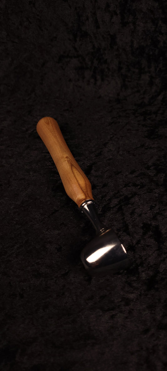 Catalpa wood coffee scoop No. 4 diagonal view on black background showing chrome dome scoop and pale tapered handle