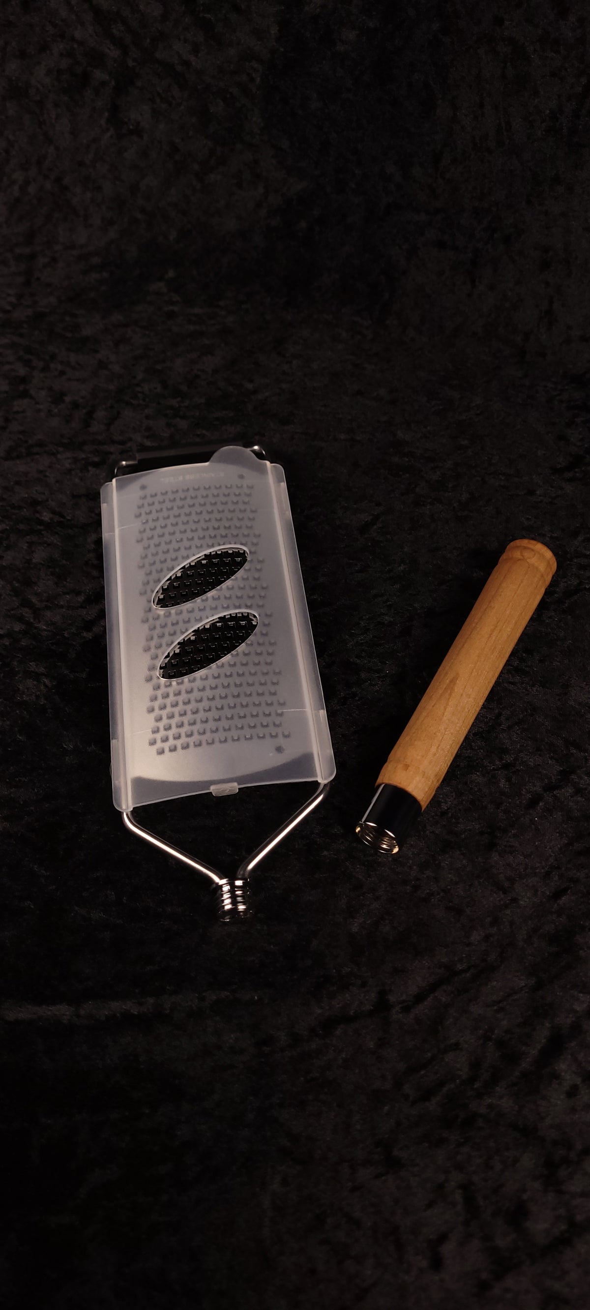 Curly maple grater with plastic guard cover and handle separated