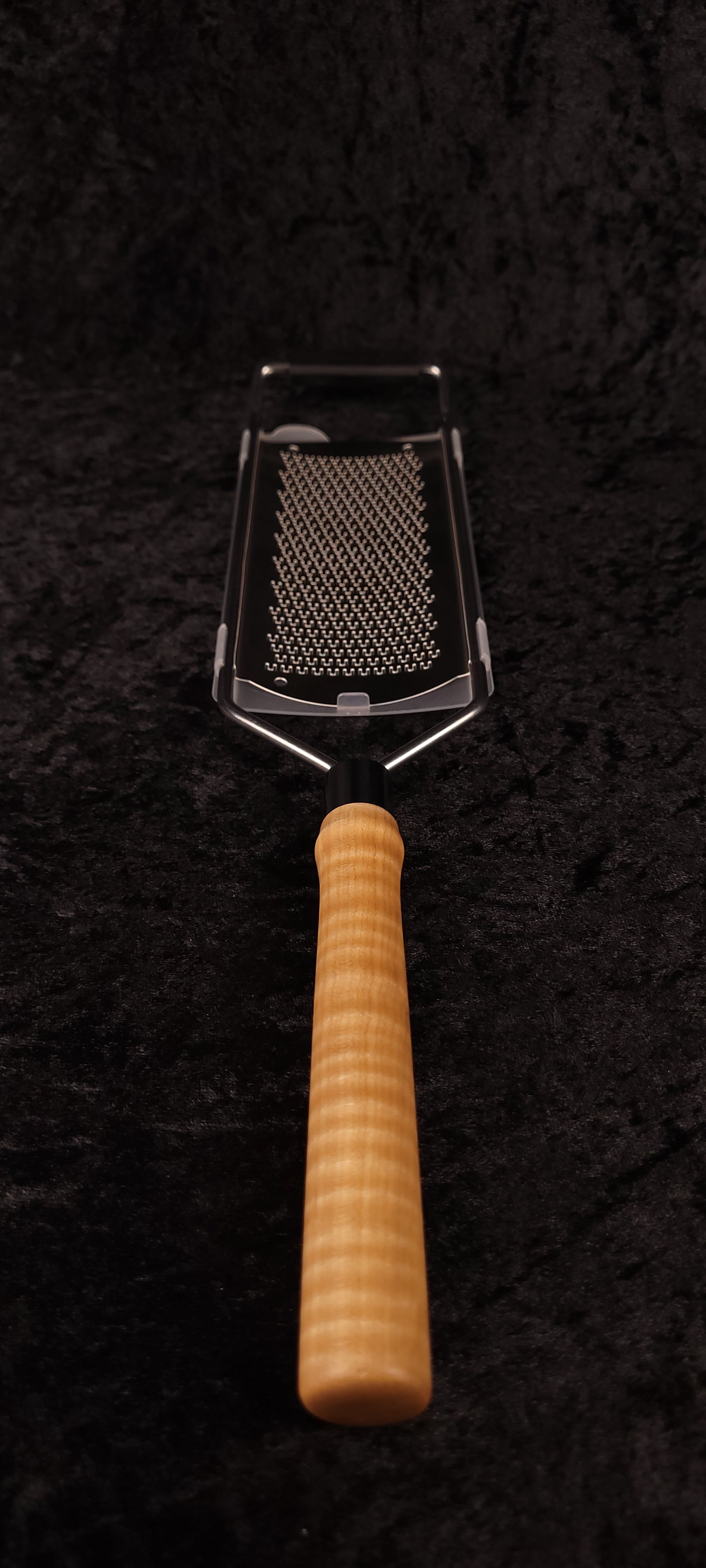 Curly maple rasp grater without guard showing rasp surface