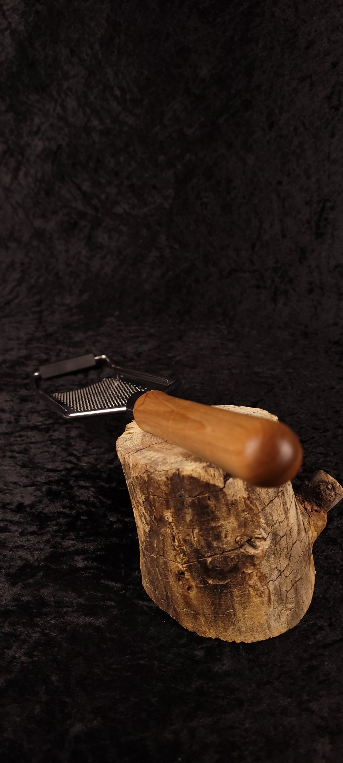 Curly maple rasp grater on wood round, alternate angle