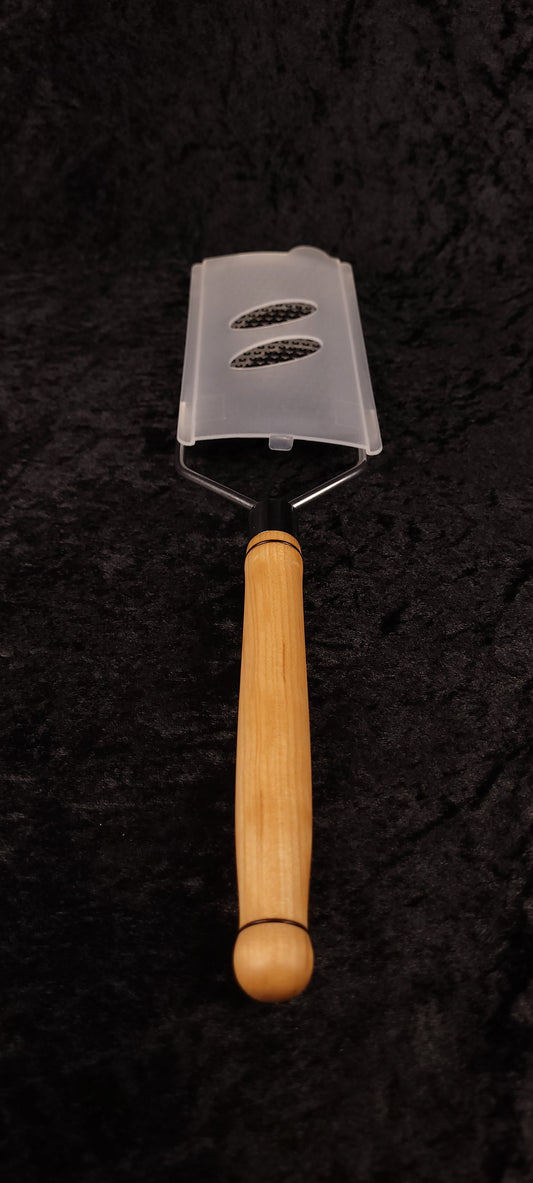 Maple flat grater full length top-down view with guard on