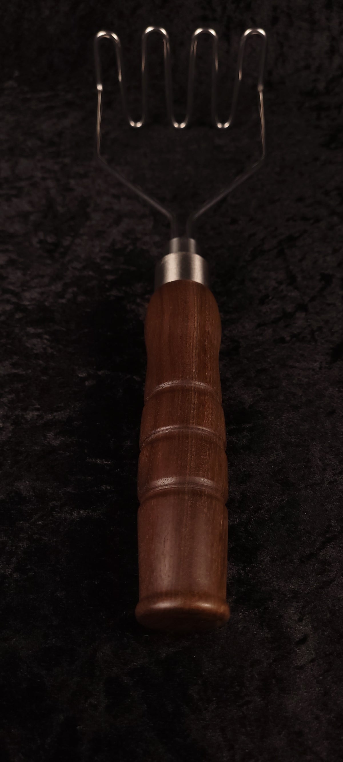 Walnut potato masher full length, alternate angle