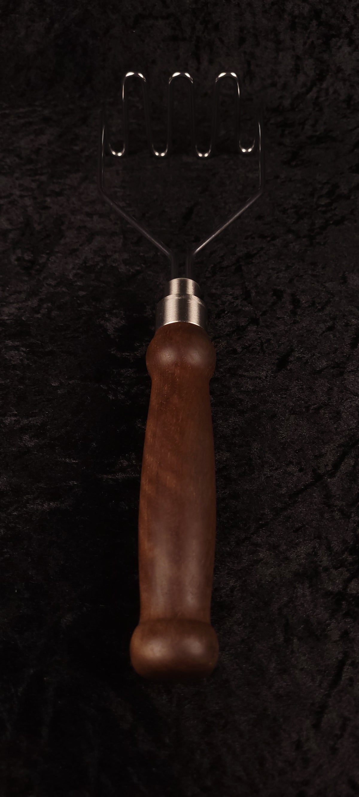 Walnut potato masher full length top-down, wire head down