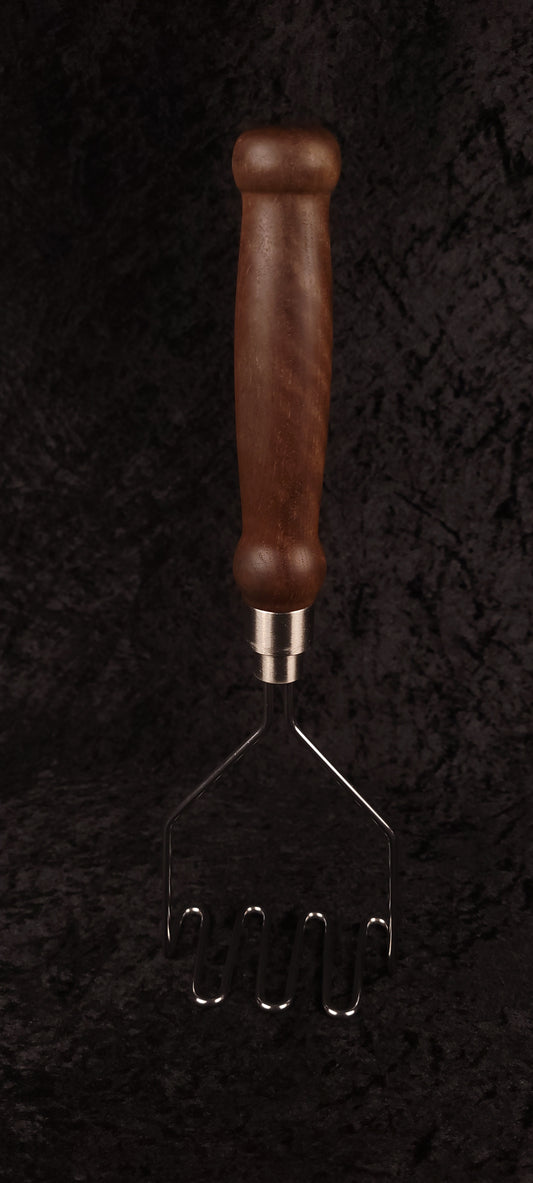 Walnut potato masher full length, handle up view