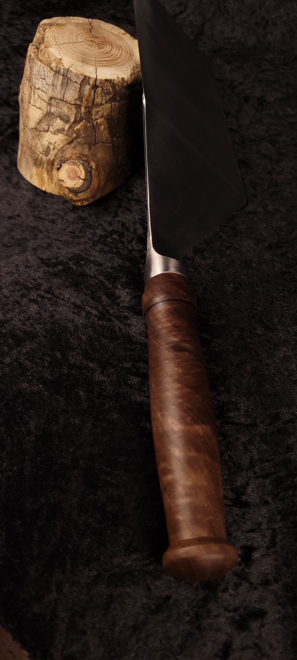 Griddle spatula – walnut handle side view with log prop