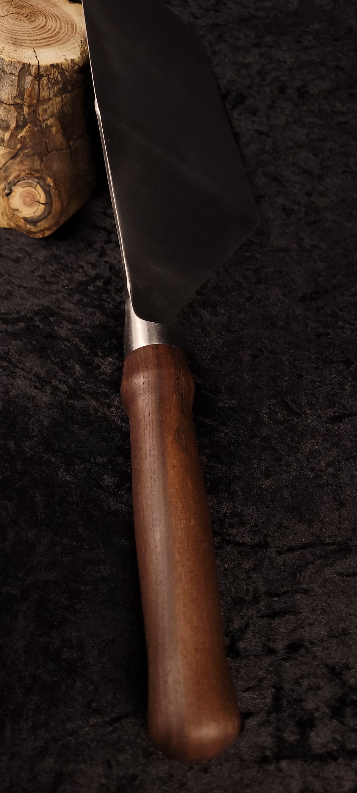 Griddle spatula walnut handle – side view with log prop