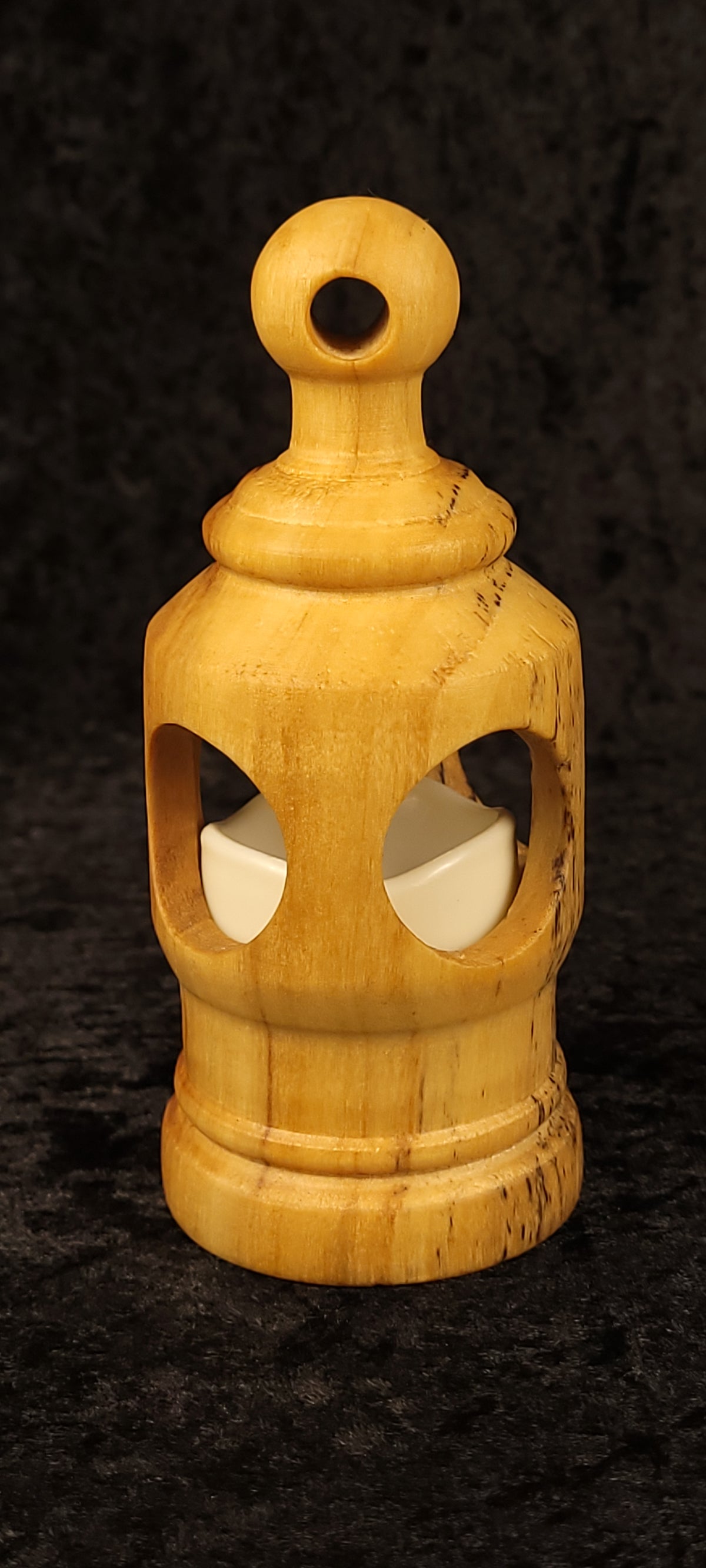 Cottonwood lantern with LED candle visible inside - side view