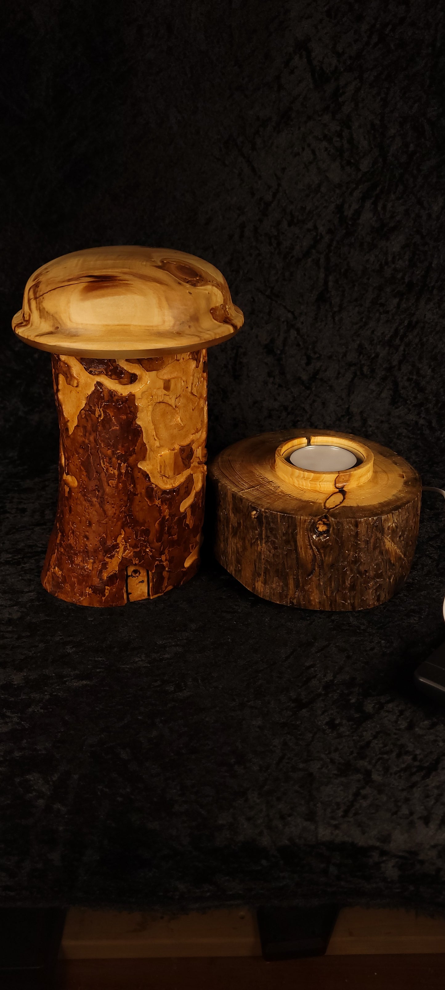Wormy Pine RGB Lamp and base shown tipped — Wet Mountain Woodcraft brand mark visible on base