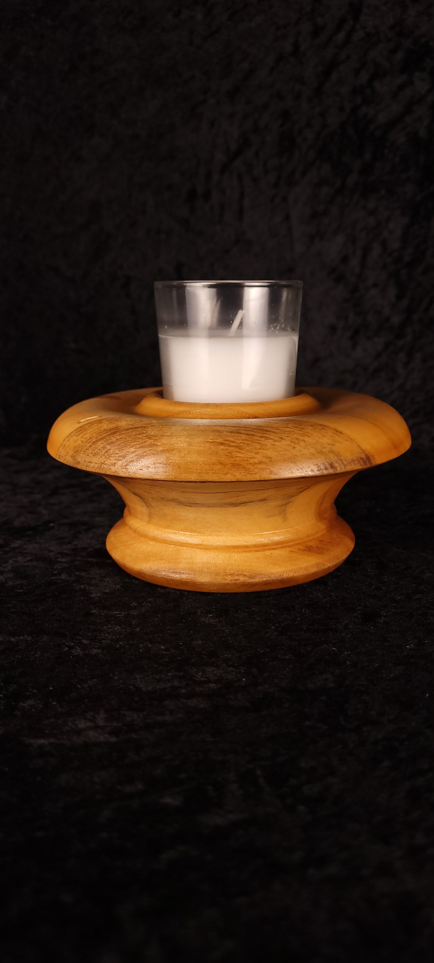 Front view of handcrafted Colorado Aspen candle holder No. 3 with glass votive candle