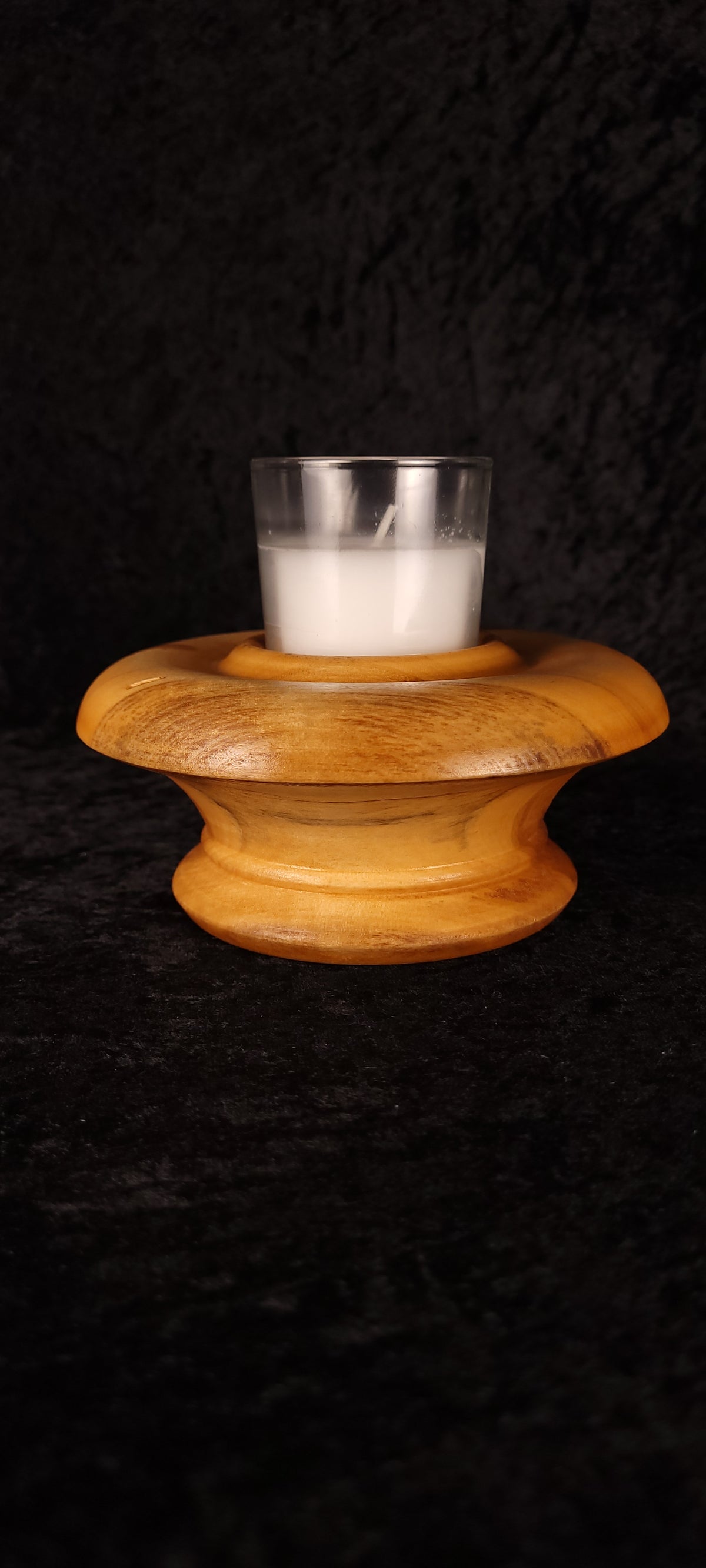 Front view of handcrafted Colorado Aspen candle holder No. 3 with glass votive candle