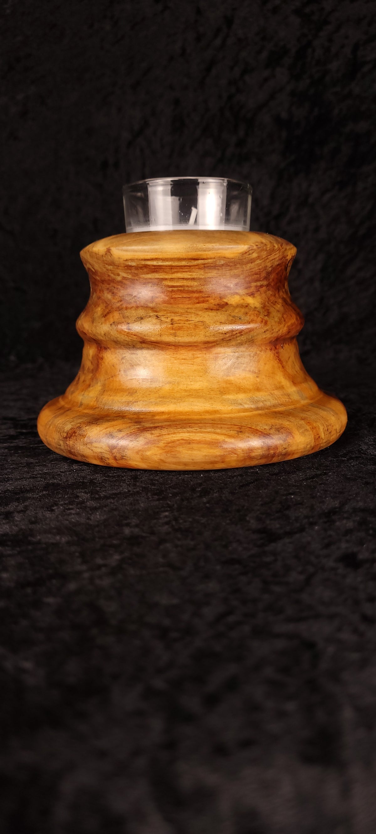 Handcrafted Aspen Candle Holder No. 5 tipped showing hollow base with votive insert beside