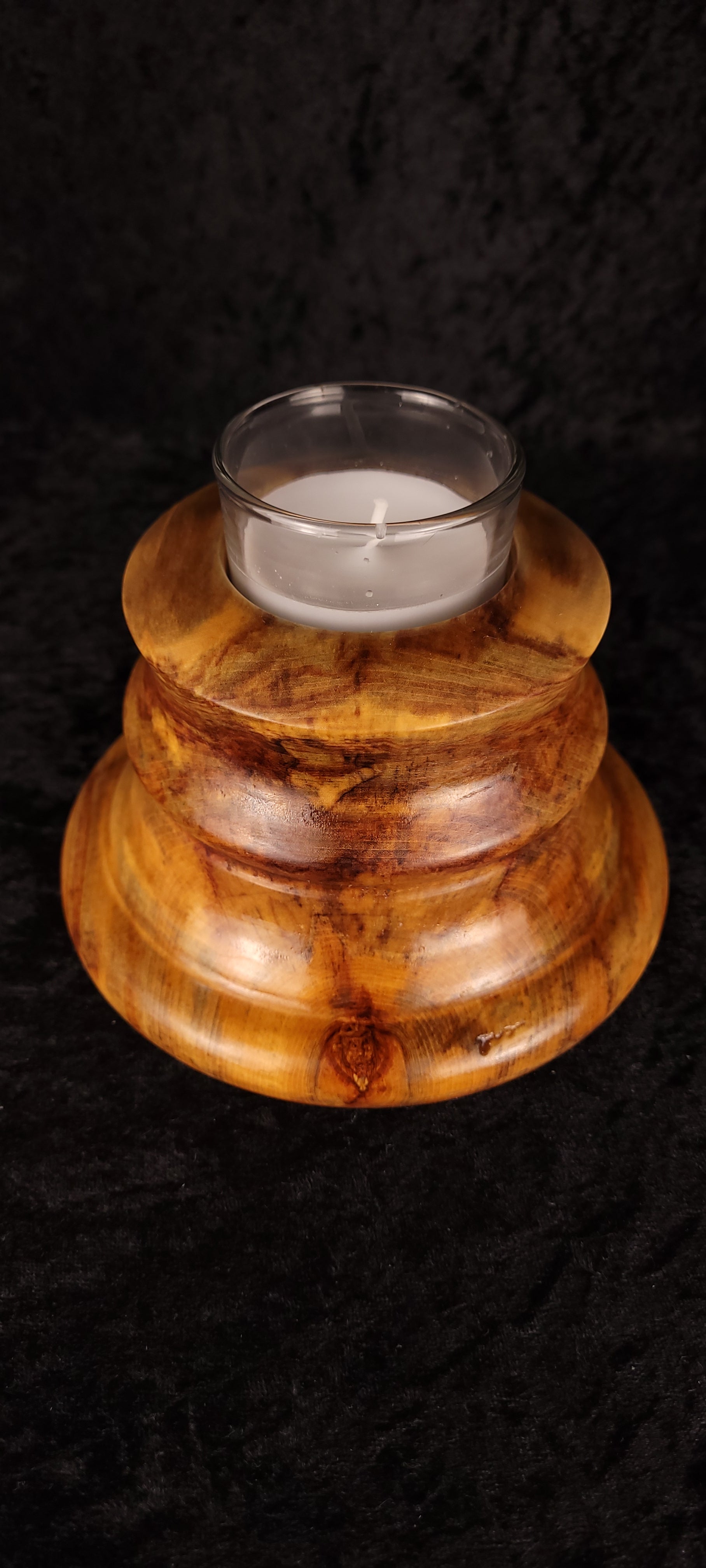 Handcrafted Aspen Candle Holder No. 5 with lit candle, top-angled view